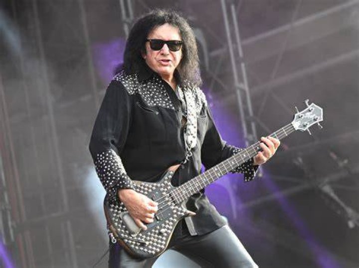 What degree does Gene Simmons have? What instrument did Gene Simmons play?